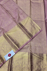 Saree with a checkered pattern and a visible brand label.