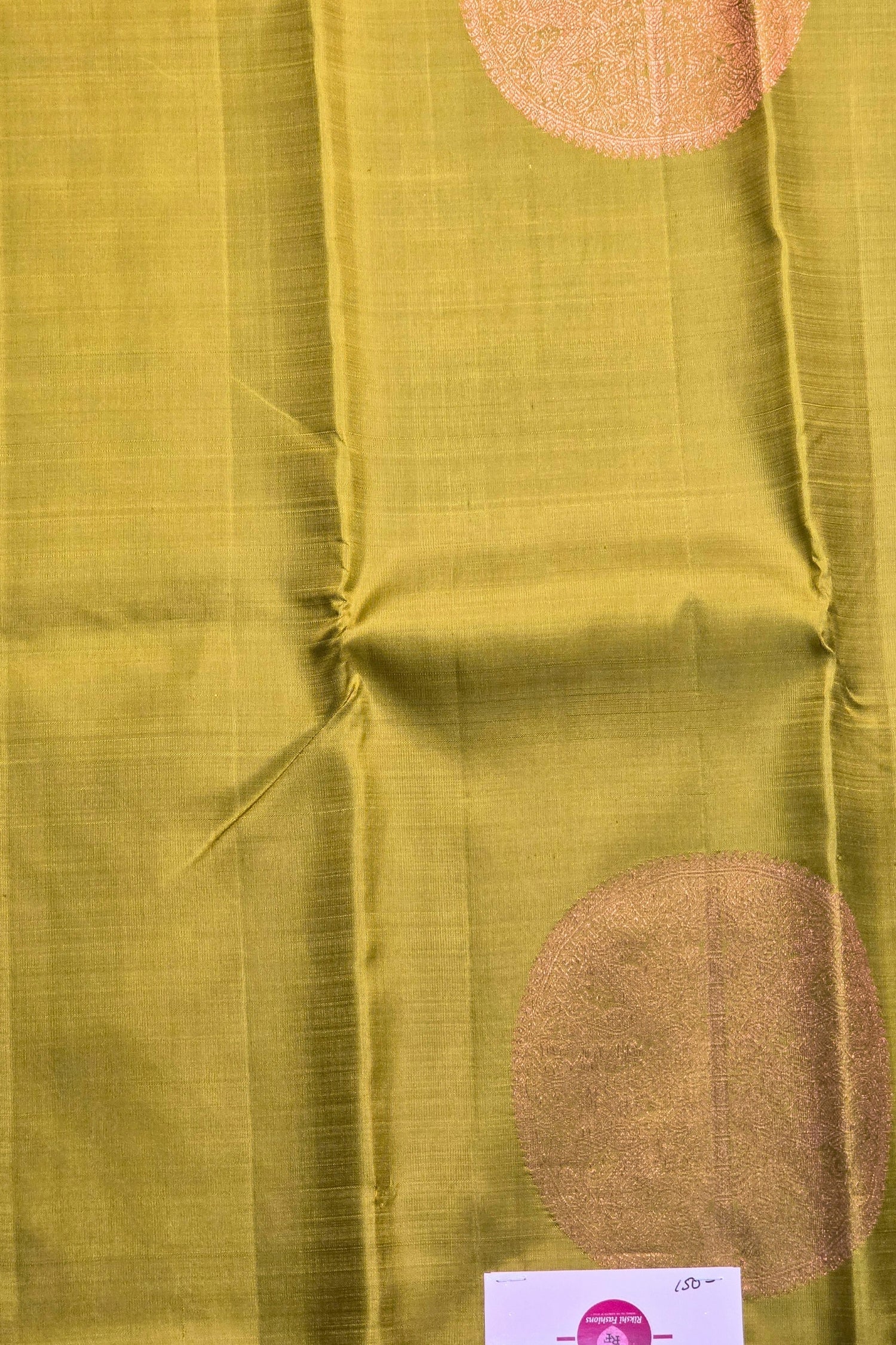 Traditional gold tone saree with subtle zari work