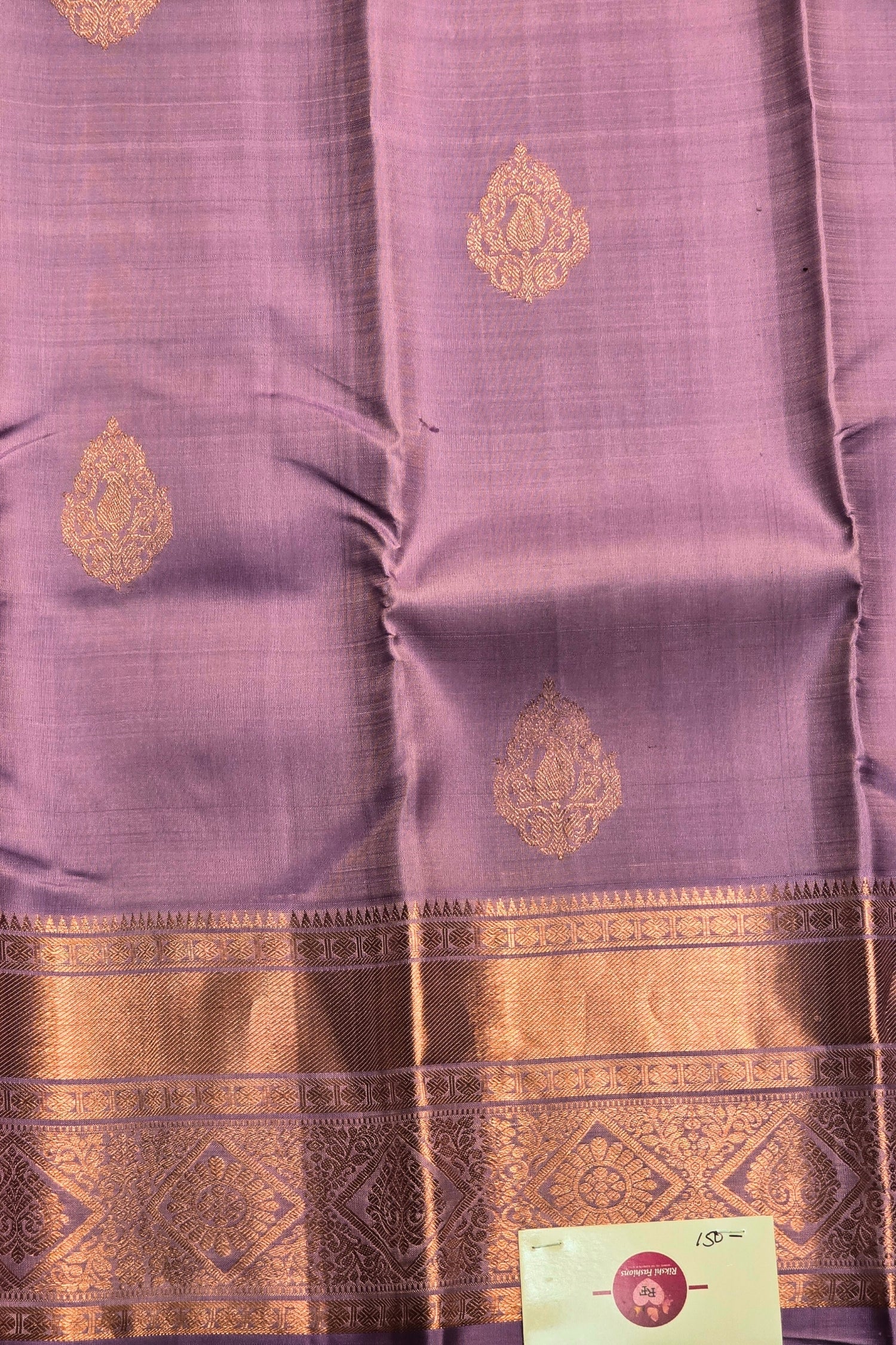 Elegant lavender tone silk saree draped view