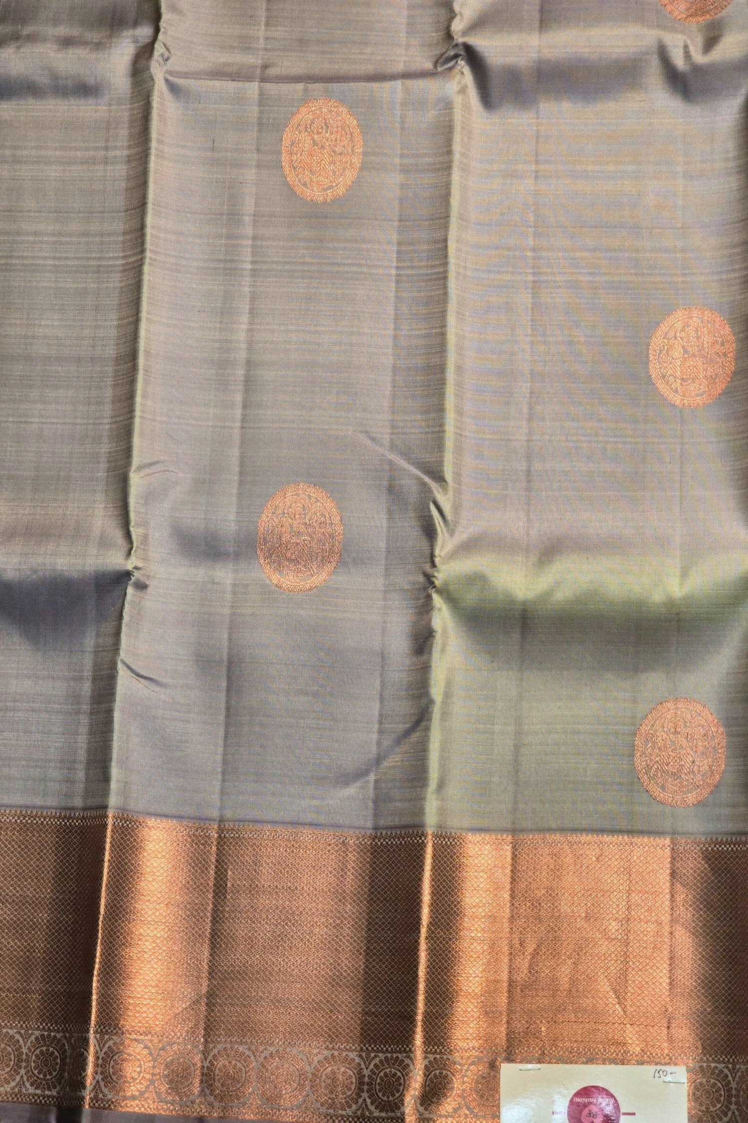 Traditional grey Kanjivaram saree with silver detailing