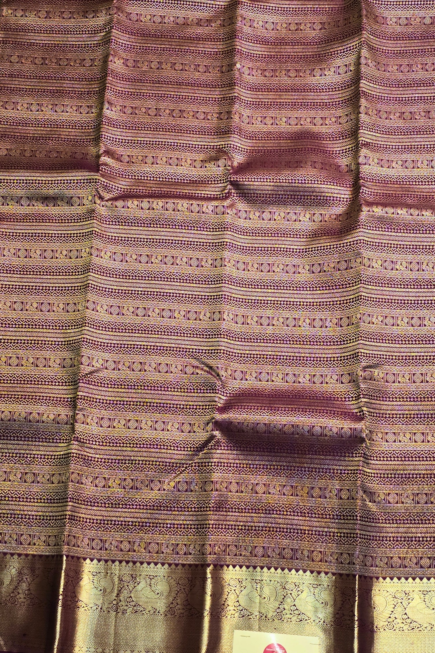 Elegant Purple Silk Saree with Silver Motifs