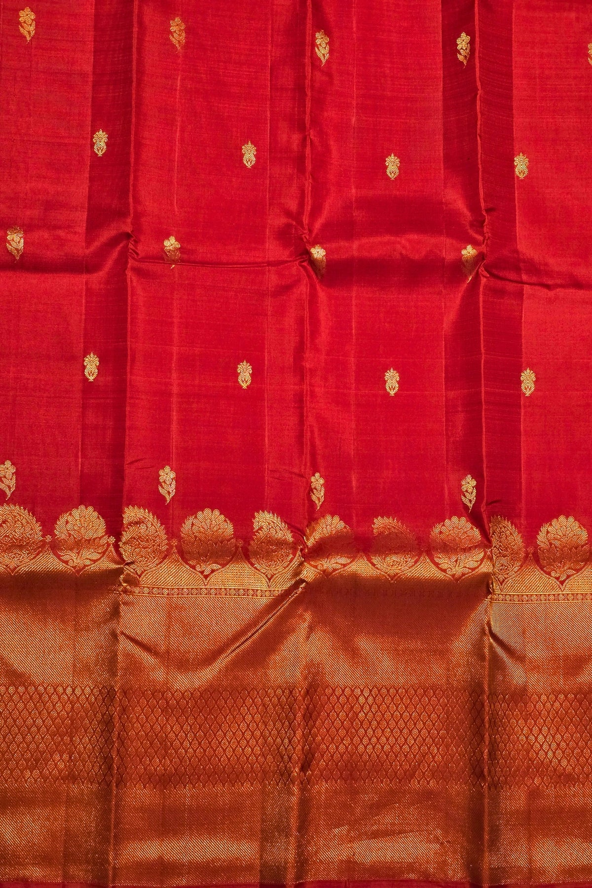 Red fabric with gold patterns