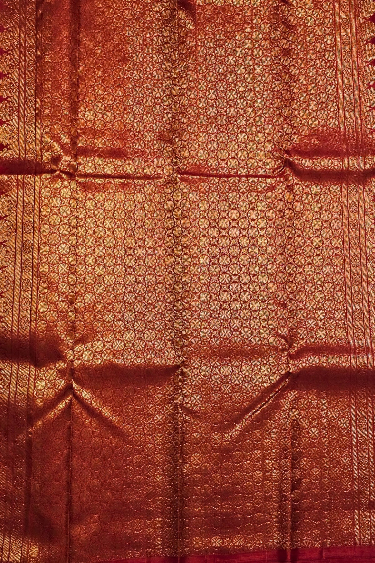 Red fabric with gold patterns