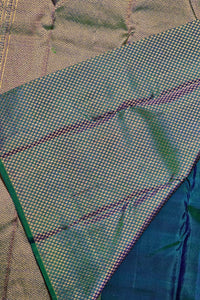 Close-up of a textured fabric with blue and green patterns