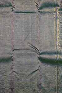 Close-up of a textured fabric with a patterned border