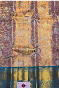 Traditional fabric with intricate patterns and a visible brand label.