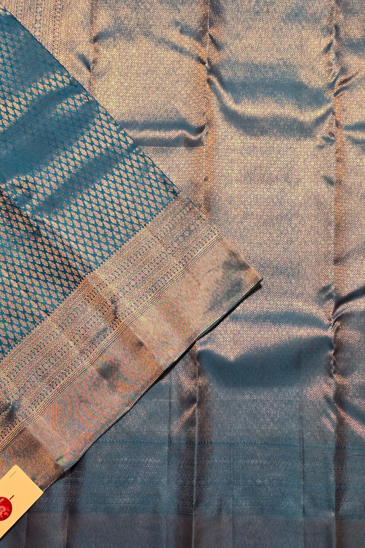 Close-up of a fabric with a textured pattern on a plain background
