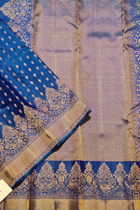 Blue and gold traditional fabric with intricate patterns