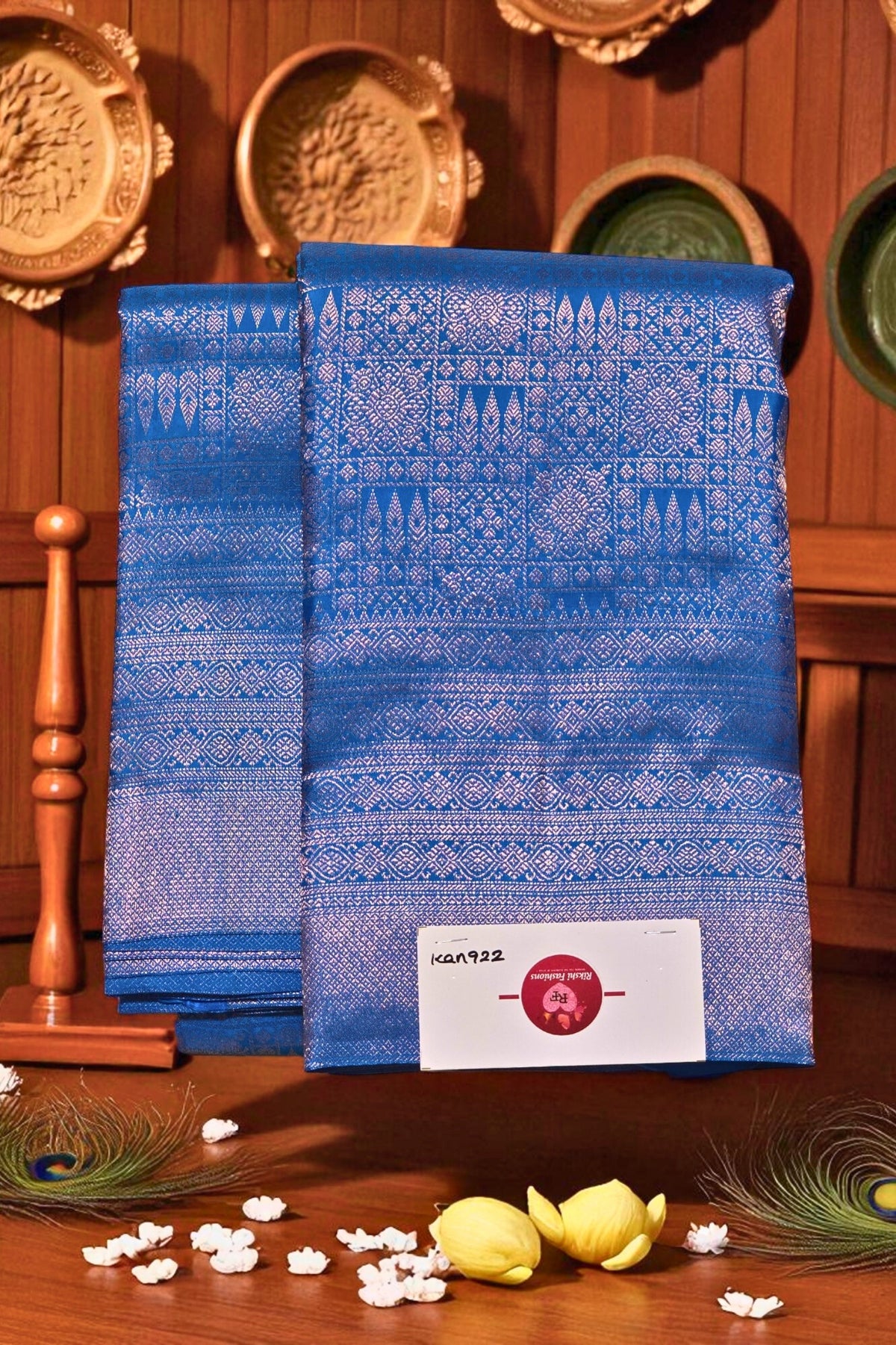Blue fabric with white patterns on a wooden surface