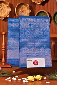 Blue fabric with white patterns on a wooden surface