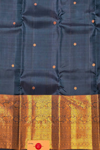 Dark blue fabric with gold and orange patterned border