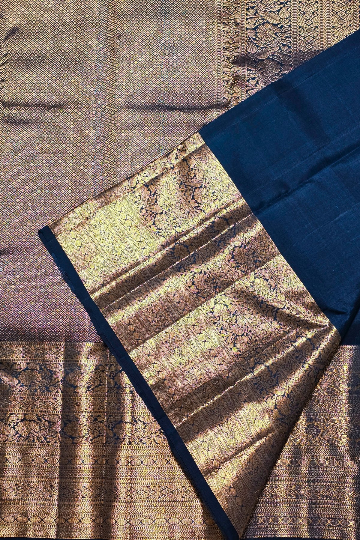 Textured fabric with a patterned edge on a textured background