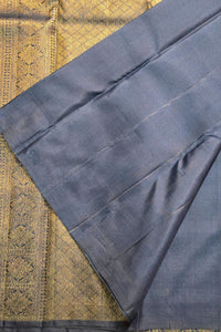 Blue fabric with a gold patterned background
