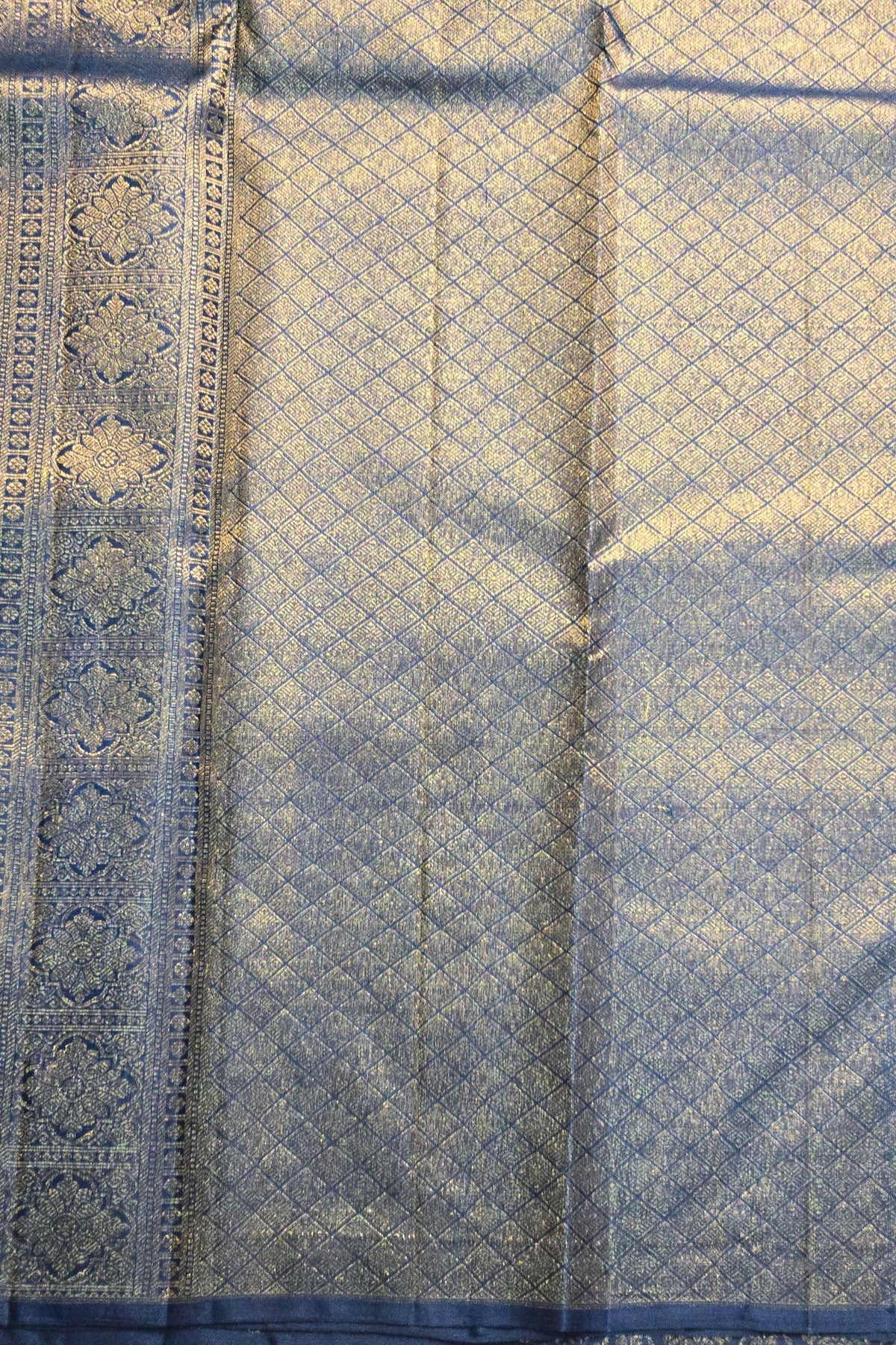 Close-up of blue fabric with intricate patterns