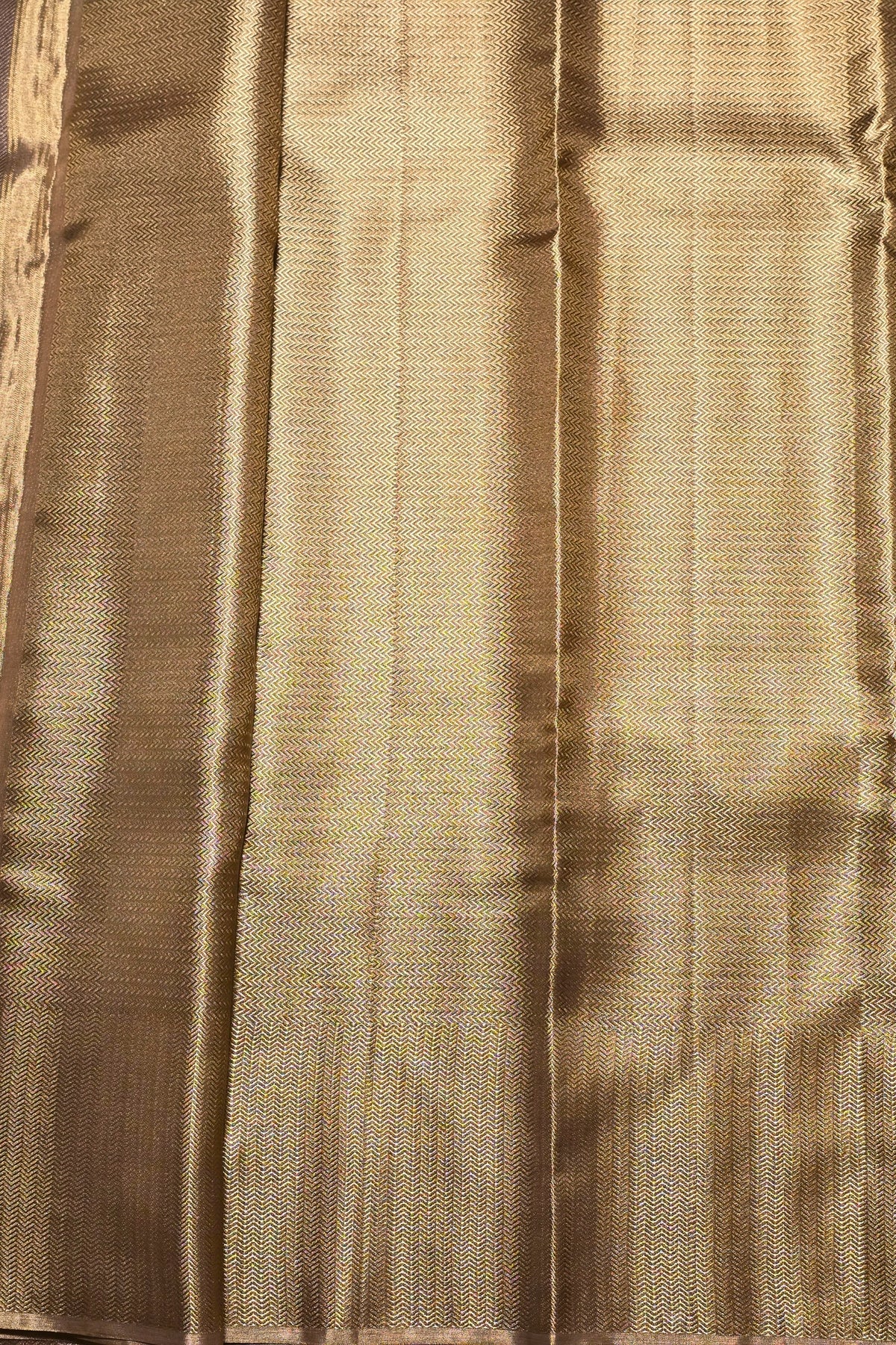 Close-up of beige fabric with a subtle pattern