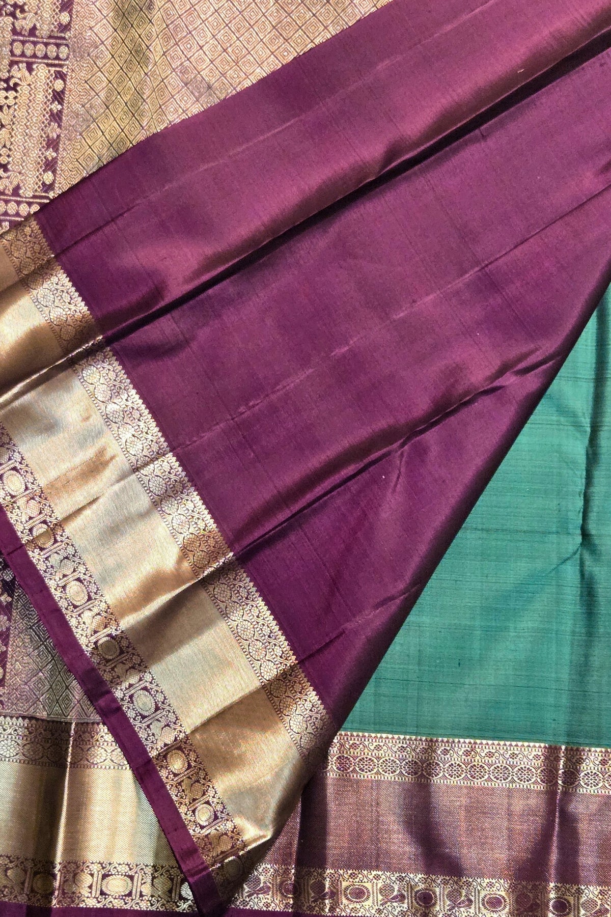 Purple fabric with gold and green border