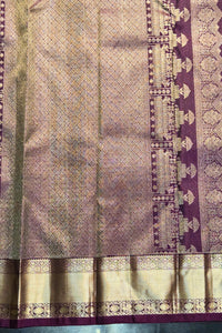 Traditional saree with intricate patterns and a border