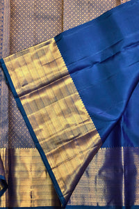 Blue and gold traditional fabric with a checkered pattern