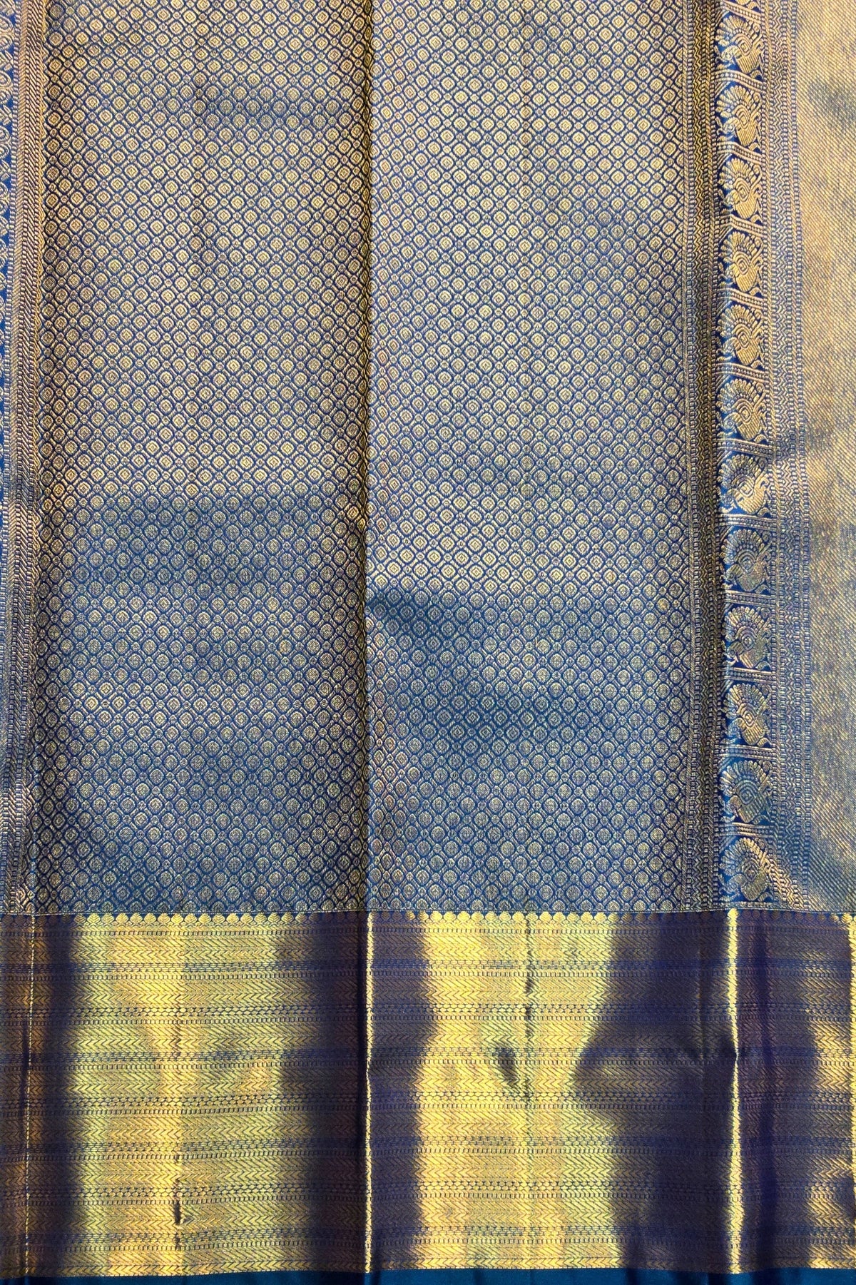 Traditional fabric with blue and gold patterns