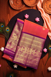 Two sarees with intricate patterns on a wooden surface with decorative elements.