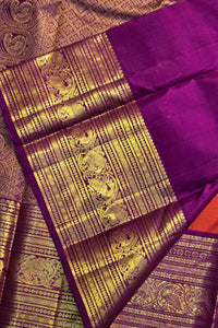 Purple saree with gold zari work and elephant patterns