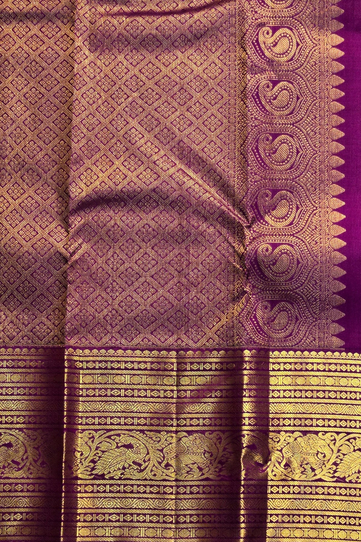 Purple fabric with gold intricate patterns
