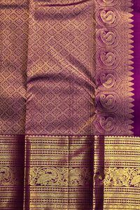 Purple fabric with gold intricate patterns