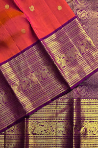 Red and purple saree with gold elephant patterns