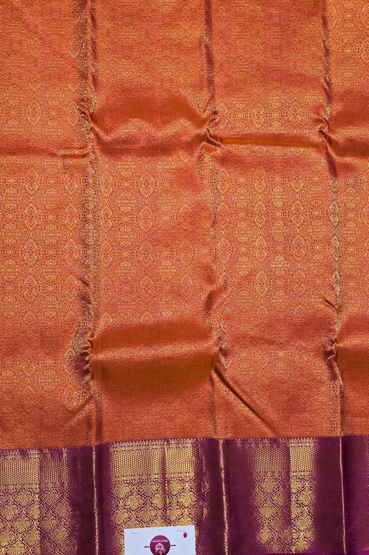 Close-up of a brown fabric with intricate patterns