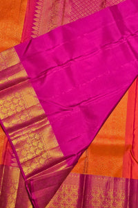Purple and gold saree with intricate patterns on an orange background