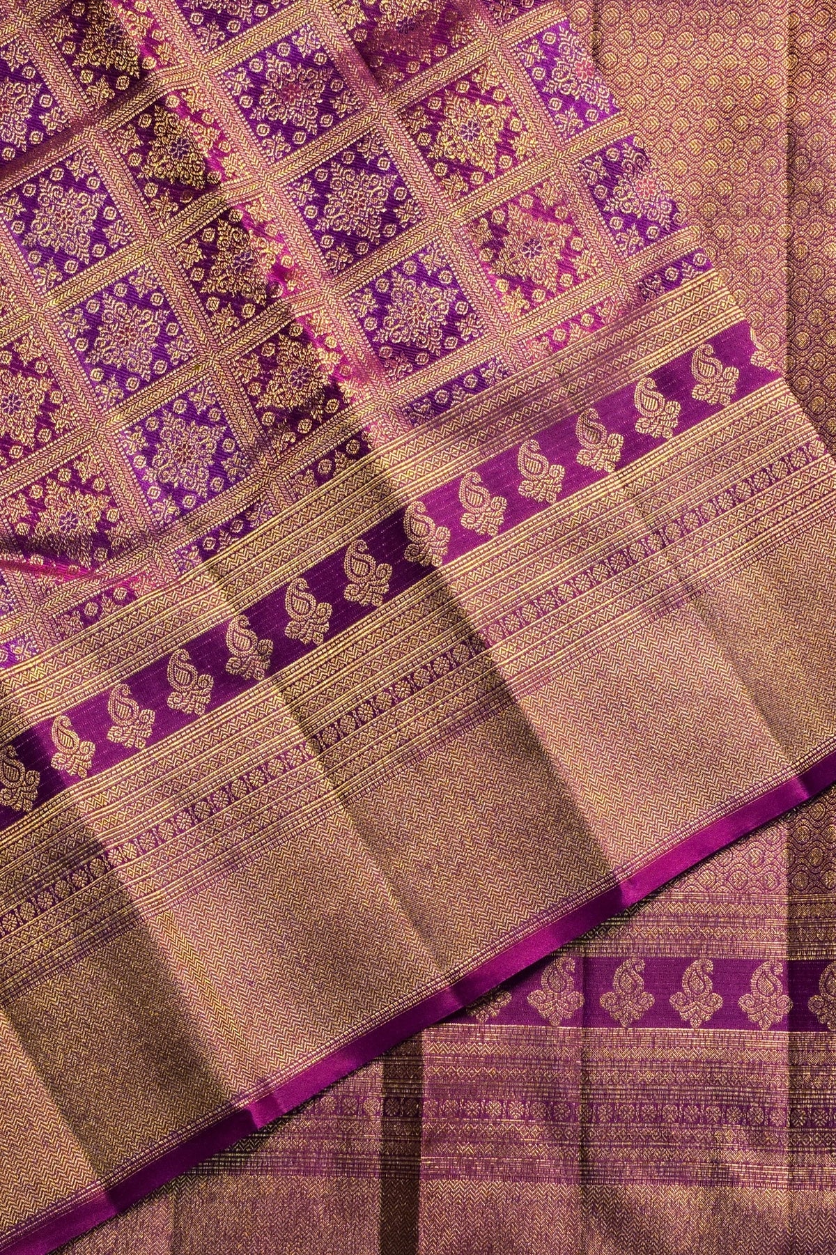 Patterned fabric with purple and gold colors