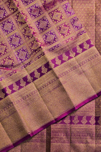 Patterned fabric with purple and gold colors