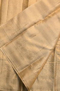 Close-up of a textured beige fabric with a diamond pattern