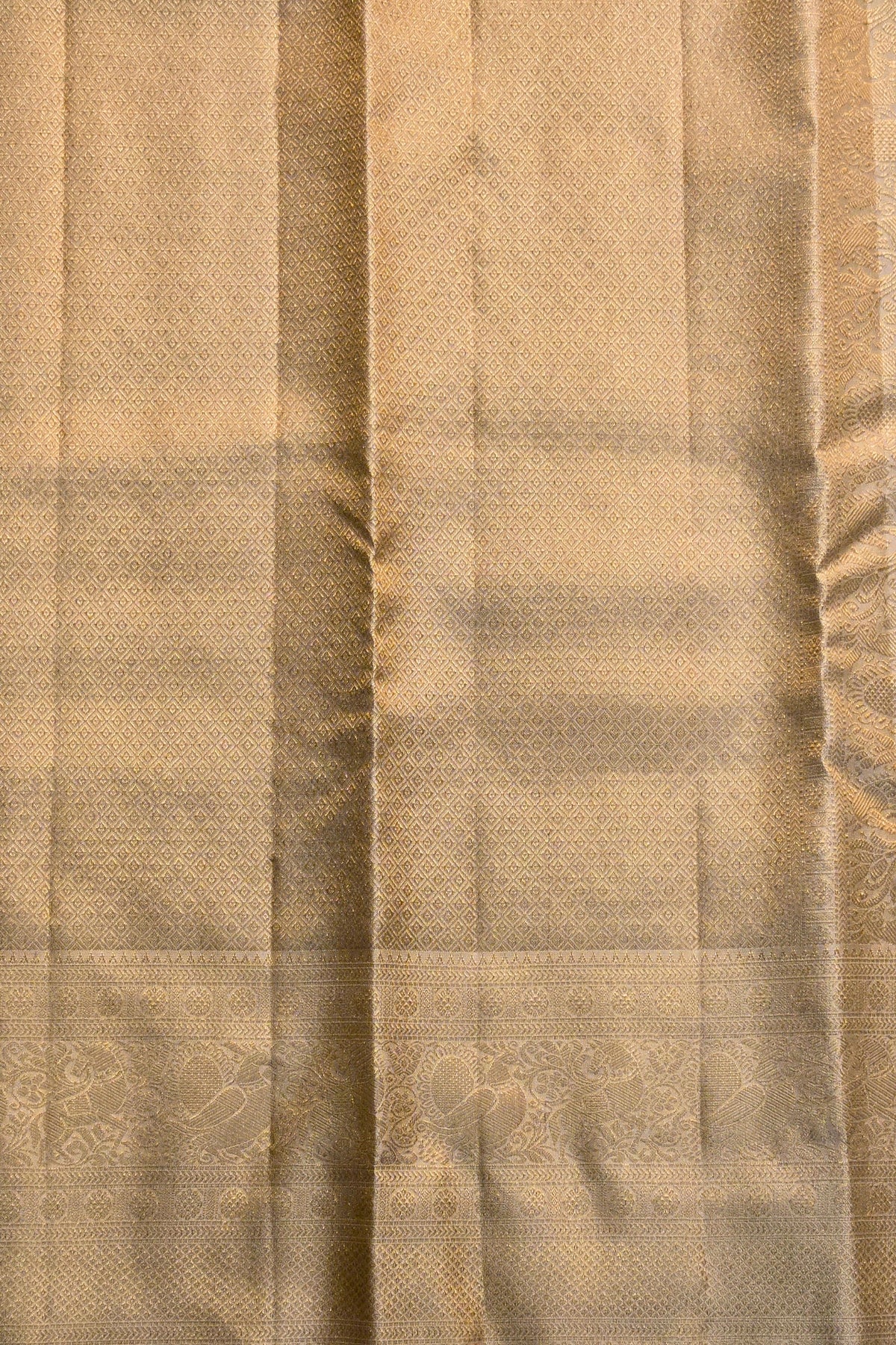 Close-up of beige fabric with subtle pattern