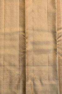 Close-up of beige fabric with subtle pattern