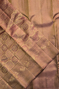Elegant Pink Kanchipuram Silk Saree with Delicate Zari Detailing