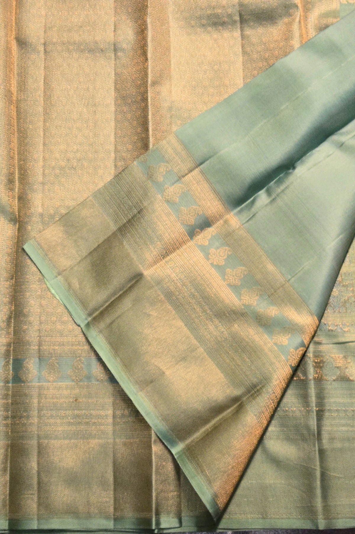 Green and brown fabric with a subtle pattern