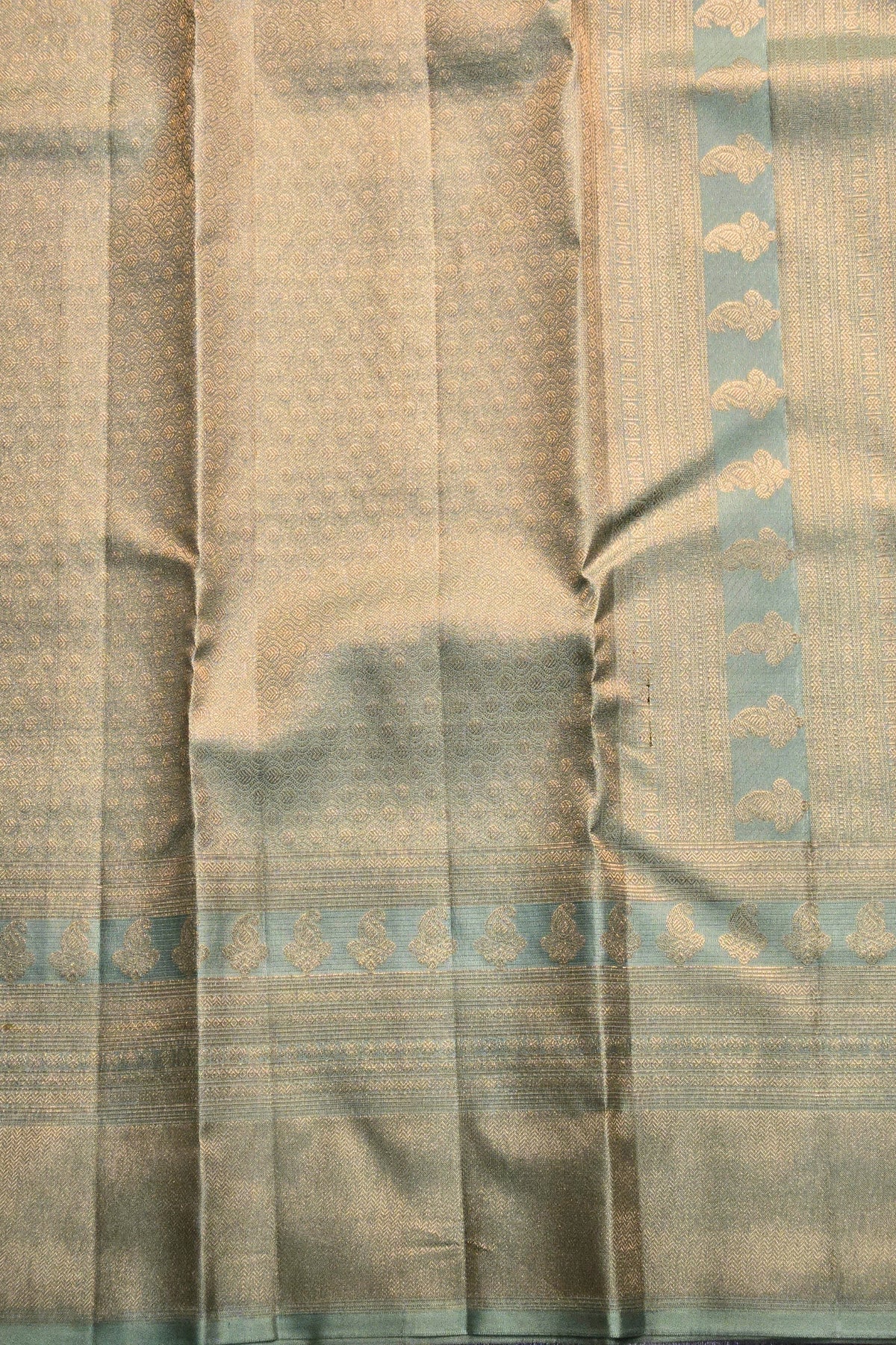 Textured fabric with a subtle pattern on a beige background