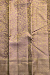 Patterned fabric with a mix of green and purple tones