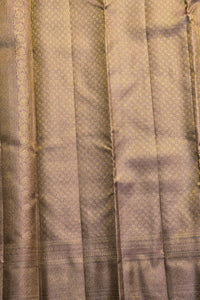 Close-up of a pleated fabric with a subtle pattern