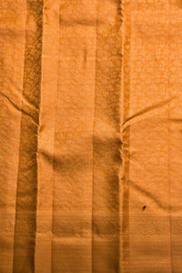 Close-up of orange fabric with visible texture