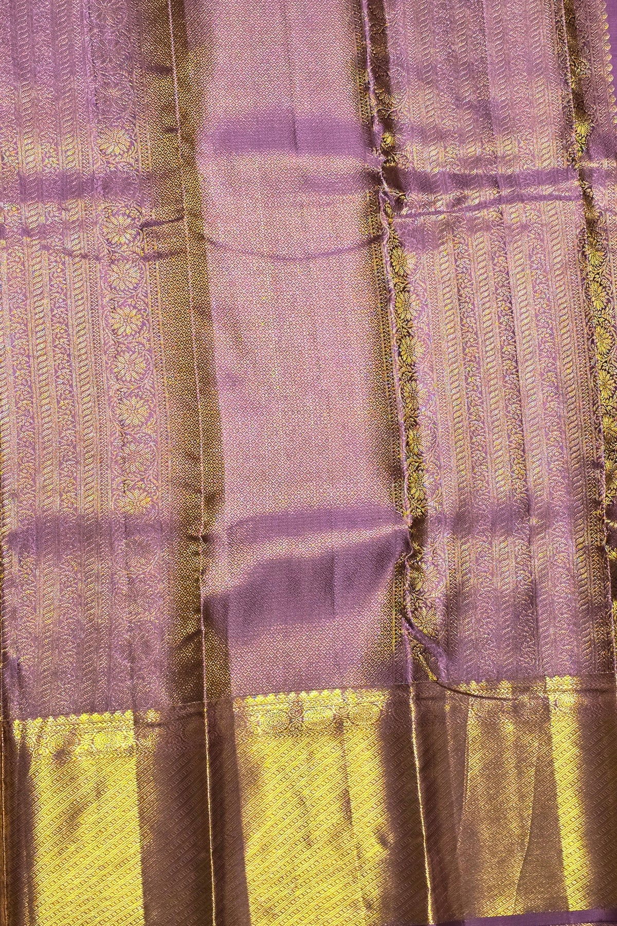 Close-up of a fabric with purple and yellow pattern