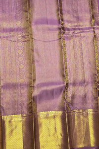 Close-up of a fabric with purple and yellow pattern