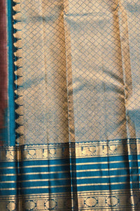 Blue and gold patterned fabric with intricate designs