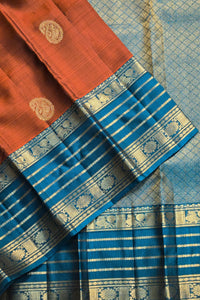 Traditional saree with red and blue patterns