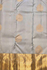 Gray fabric with gold leaf patterns