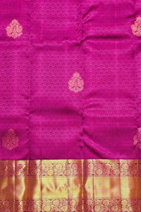 Pink saree with gold patterns