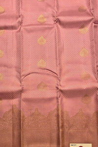 Pink fabric with gold patterns