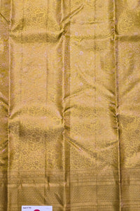 Gold fabric with intricate patterns and textures