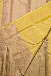 Close-up of a fabric with a textured pattern and yellow lining